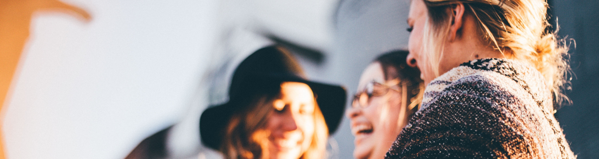 Group of women laughing together.