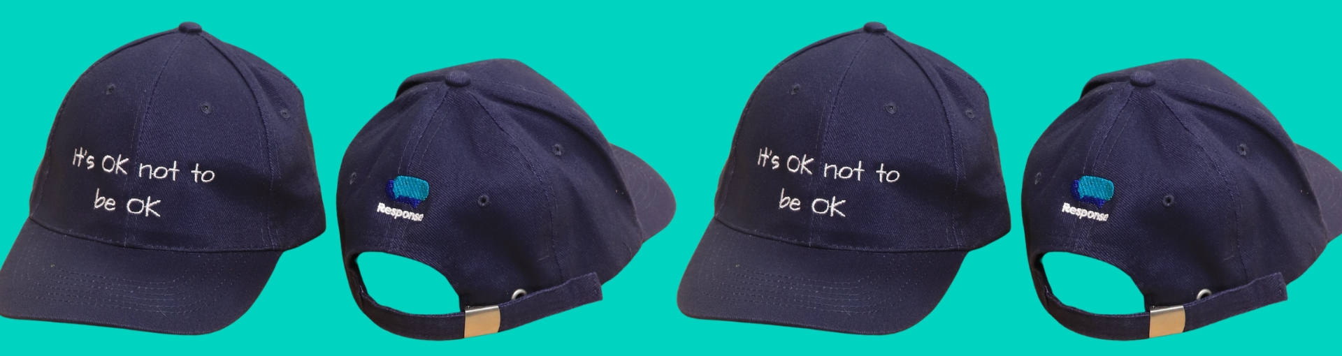 Photos of navy blue baseball caps in a row with an aqua background. Embroidered on the front of the cap in white is the wording 'It's OK not to be OK. On the back is the Response logo.